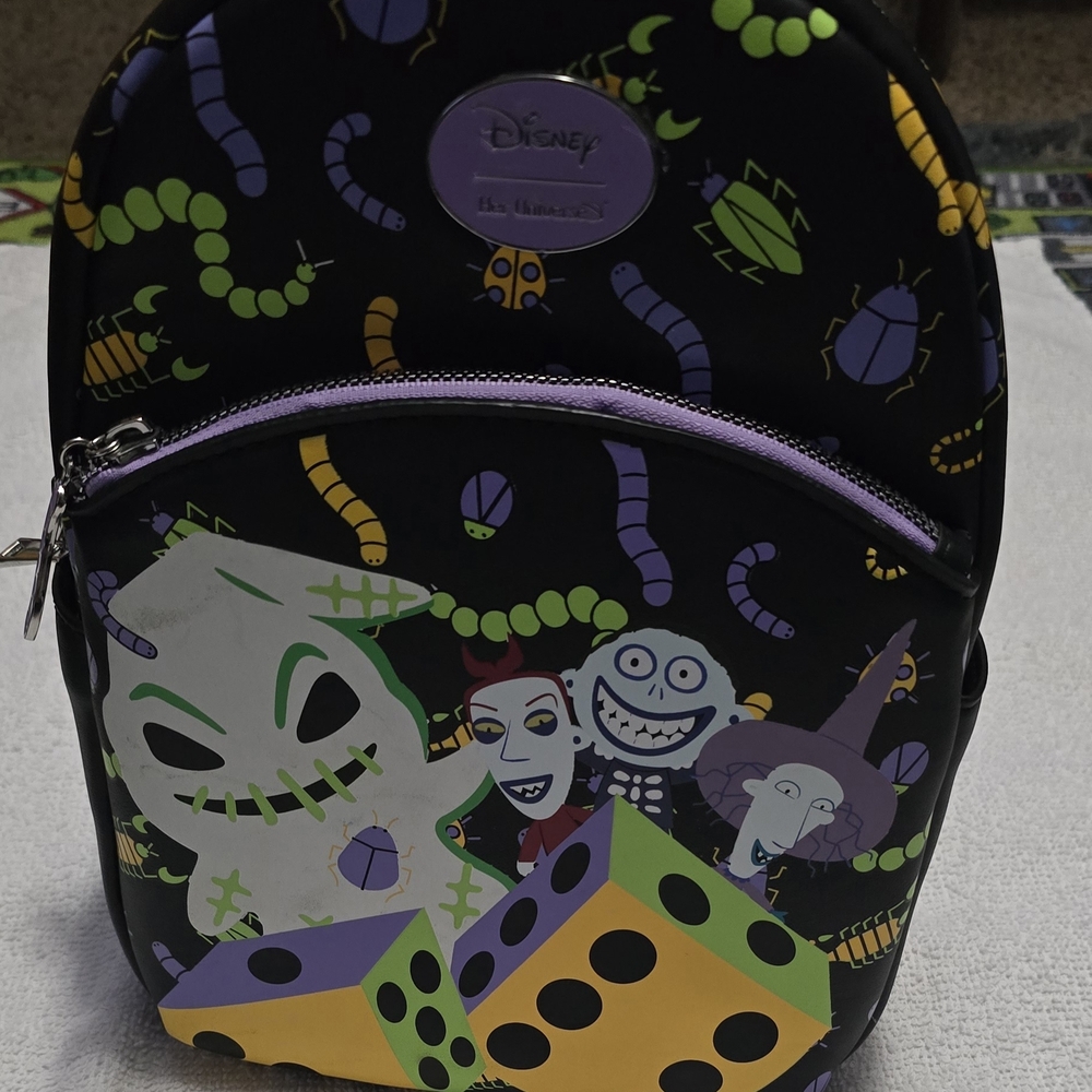 The Nightmare Before Christmas Glow-
In-The-Dark Oogie Boogie Dice Mini Backpack